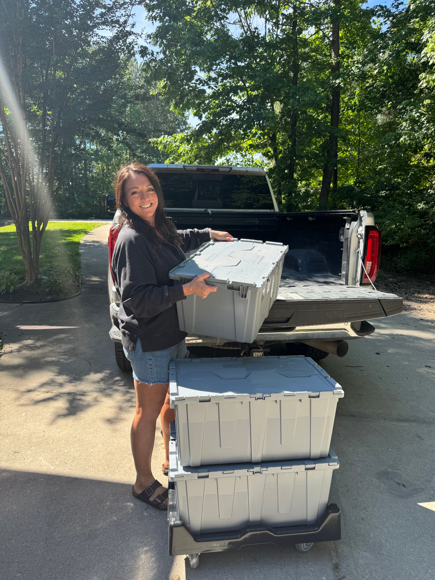 Stacked Tidy Move Co. totes ready for a specialized package